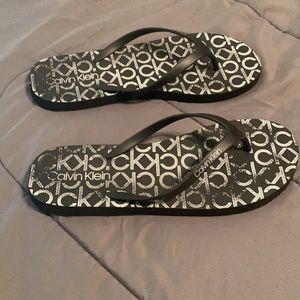 (Size 9/10) Calvin Klein logo flip flops